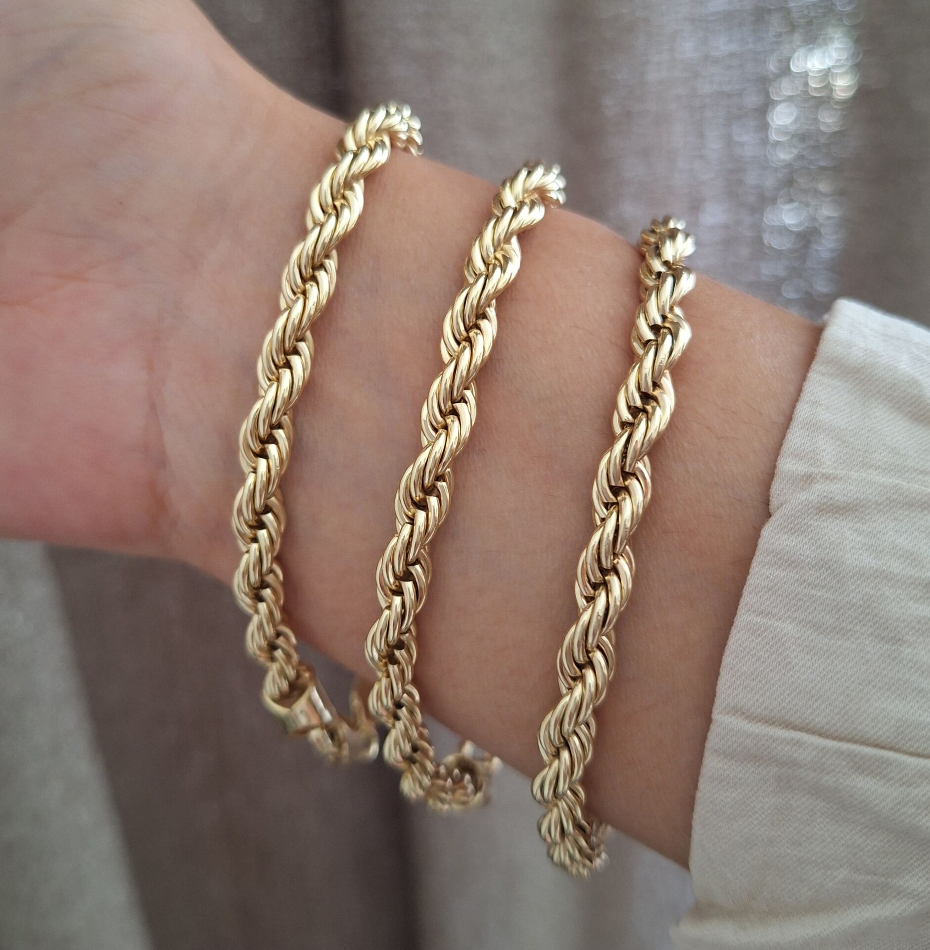 XUPİNG BURGU BİLEKLİK 14 AYAR ALTIN RENGİ